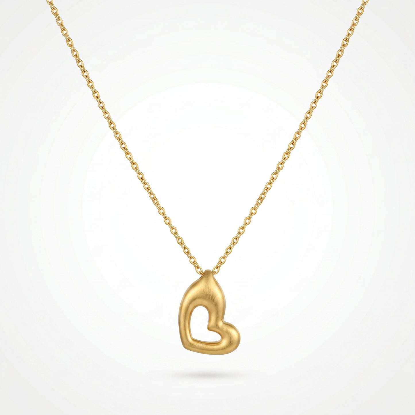 Sculpted Heart Necklace & Earrings Set – Modern Gold Jewelry for Effortless Romance