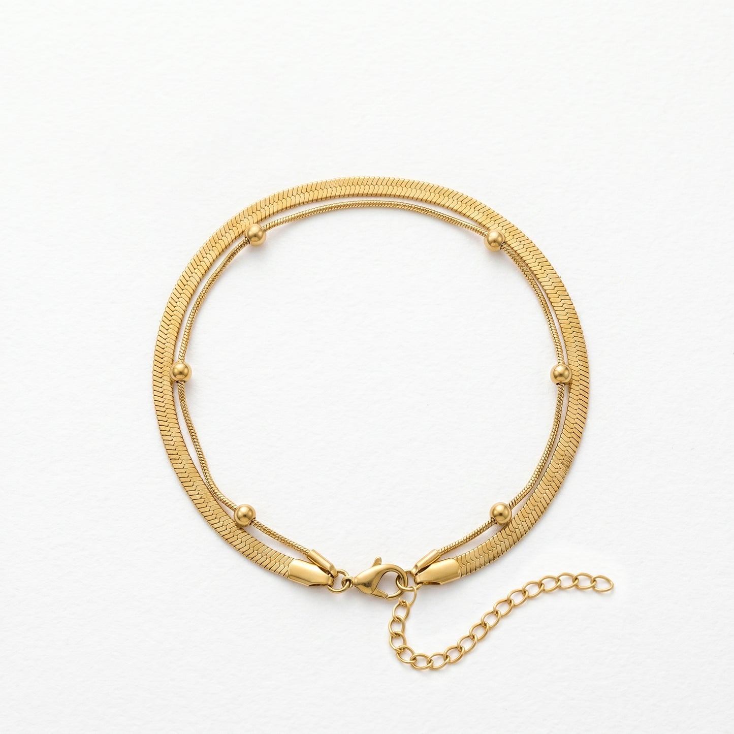 The Elegant Gold Anklet Your Summer Jewelry Stack Needs