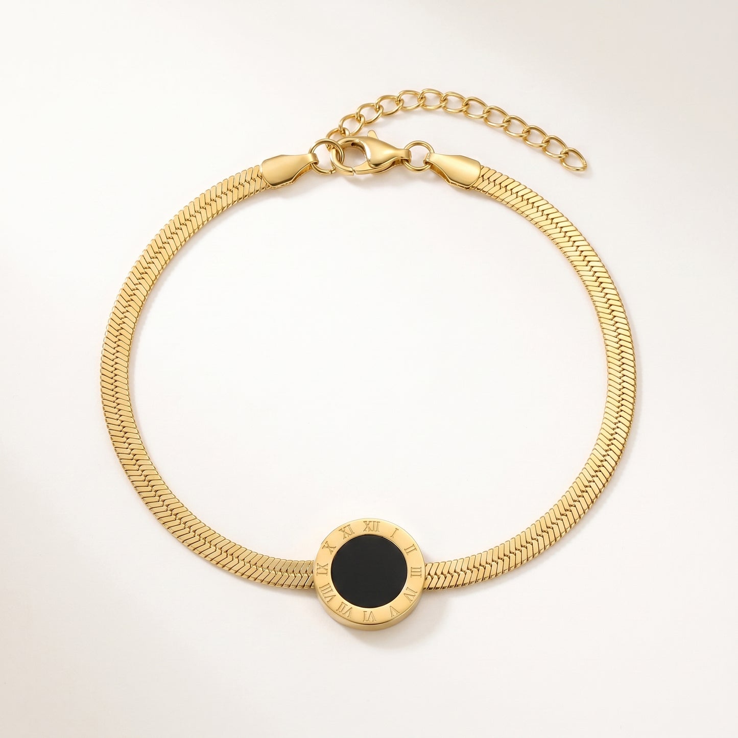 A Minimal Gold Anklet with a Timeless Roman Numeral Design